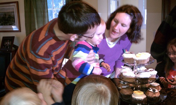 Aron, Barb and Linda blowing out cake (10-16-2010 16:38)