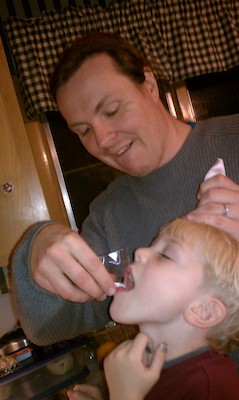 Cole ingesting frosting (12-13-2010 18:41)