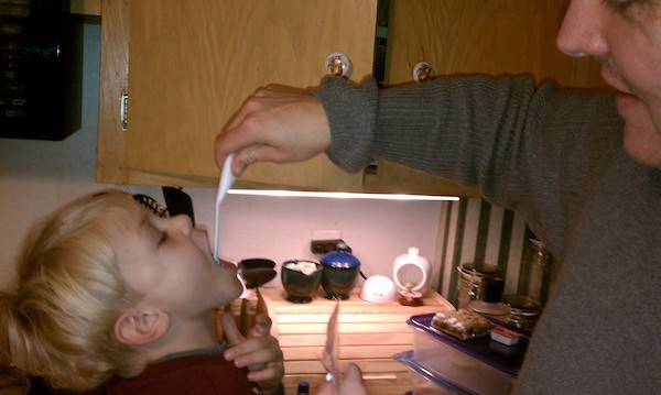 Cole ingesting frosting (12-13-2010 18:42)