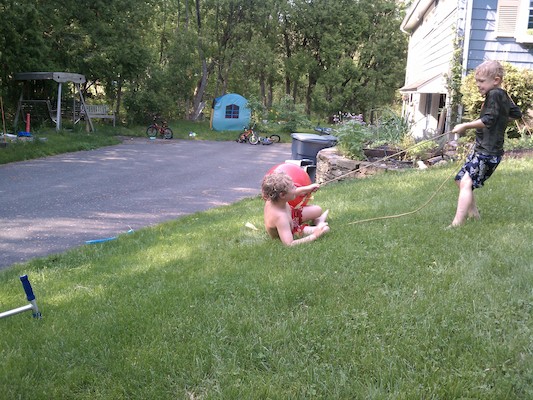 Tim and Cole playing in the sprinklers (05-26-2011 16:17)