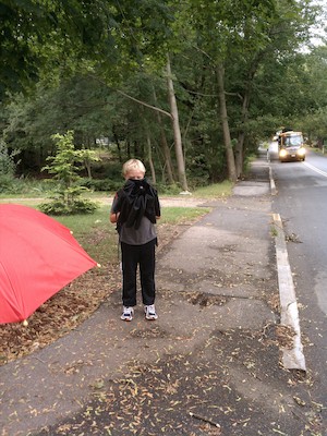 Tim with a brolly walking home (09-06-2011 15:05)