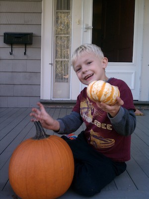 Cole and pumpkins (10-16-2011 16:37)