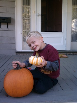 Cole and pumpkins (10-16-2011 16:37)