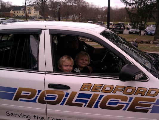 Cole and Tim in the police car (03-24-2012 15:15)
