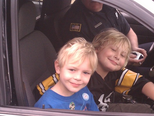 Cole and Tim in the police car (03-24-2012 15:18)