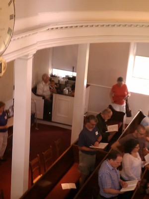 Olivia showing Rich how to run the sound at First Parish (05-27-2012 10:10)