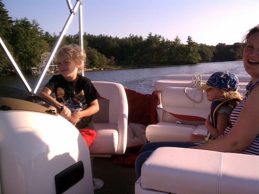 Cole piloting the boat with Linda and Barb (07-22-2012 18:35)
