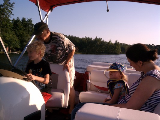 Cole piloting the boat with Poppy, Linda and Barb (07-22-2012 18:35)