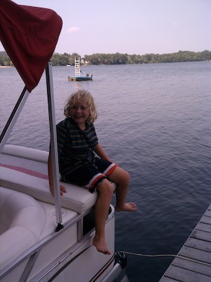 Tim on the boat with cormorants (08-17-2012 16:29)