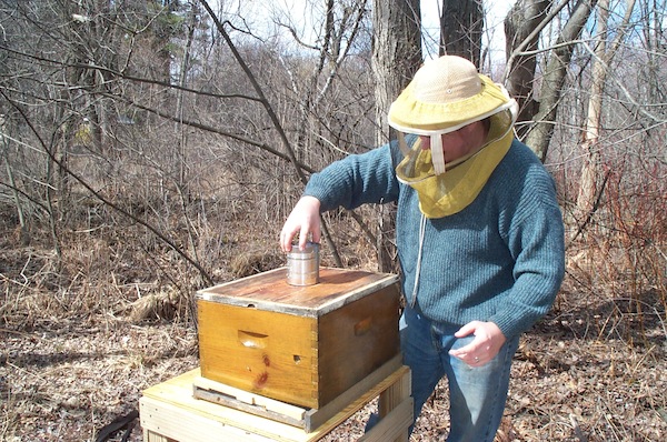 Putting on the syrup feeder
