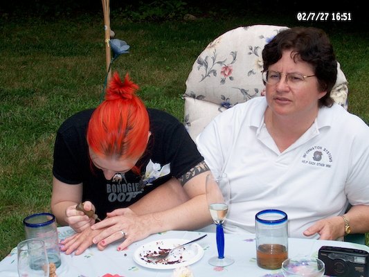 Beth applying henna to Rosalie