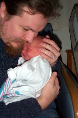 Tim sleeping on dad (3-1-03)