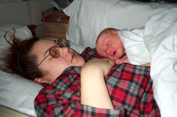 Tim sleeping with mum (3-1-03)