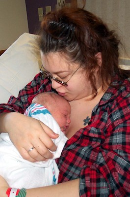 Tim sleeping with mum (3-1-03)