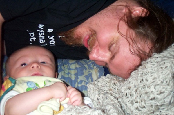 Cuddling on the bed (5-29-03 7:52PM)