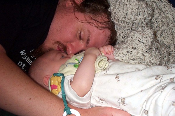 Cuddling on the bed (5-29-03 7:52PM)