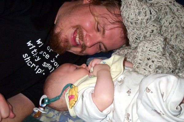 Cuddling on the bed (5-29-03 7:52PM)