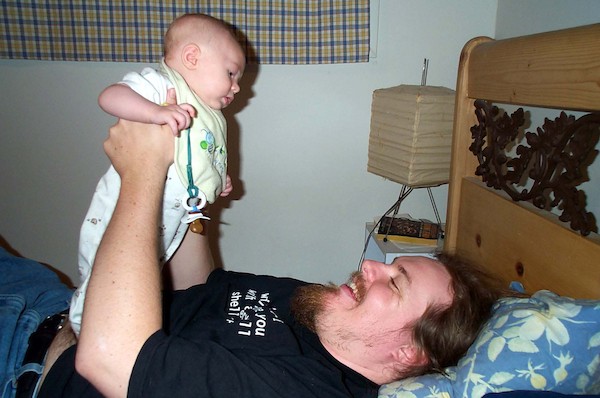 Standing on daddy (5-29-03 7:56PM)