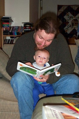 Tim reading to Daddy