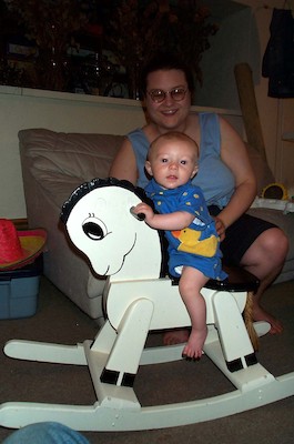 Tim on rocking horse (7-2-2003 7:12PM)
