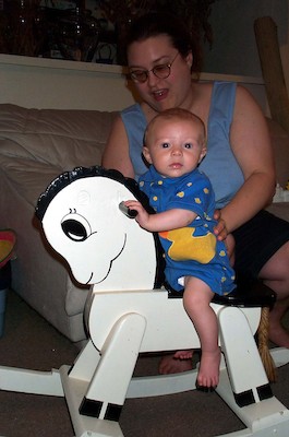Tim on rocking horse (7-2-2003 7:13PM)
