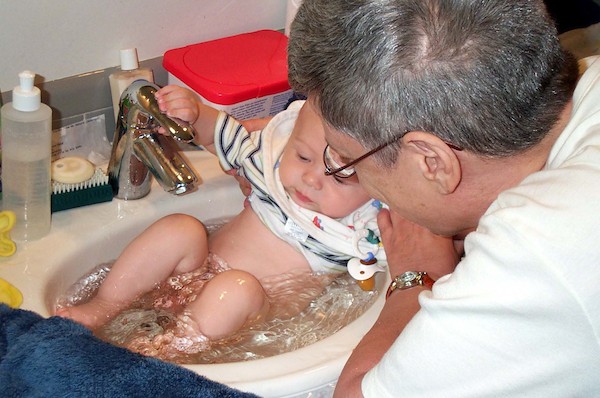 Grandma bathing Tim (7-17-2003 11:39AM)