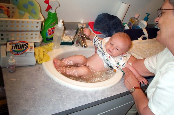 Grandma bathing Tim (7-17-2003 11:39AM)