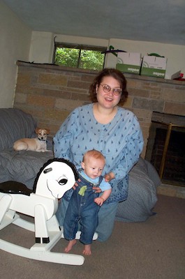 Tim next to rocking horse (9-1-2003 11:23AM)