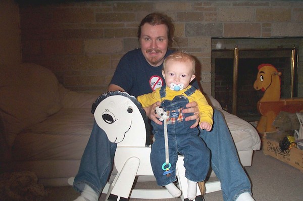 Tim and rocking horse (11-2-2003 18:08)