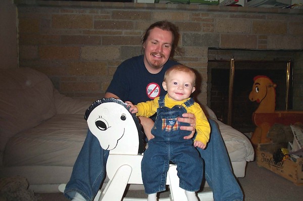 Tim and rocking horse (11-2-2003 18:08)