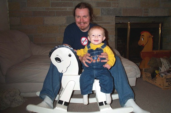 Tim and rocking horse (11-2-2003 18:09)