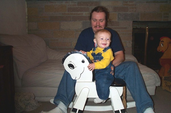 Tim and rocking horse (11-2-2003 18:09)