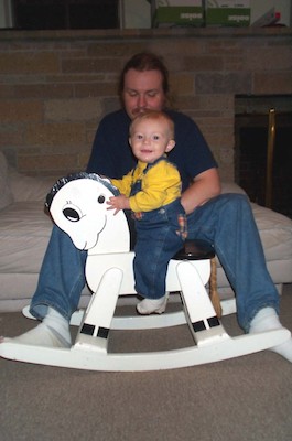 Tim and rocking horse (11-2-2003 18:10)