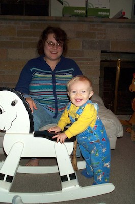 Tim next to Rocking Horse (12-03-2003 19:55)
