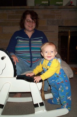 Tim next to Rocking Horse (12-03-2003 19:55)