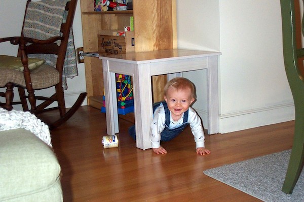 Tim crawling under table (12-28-2003 18:26)