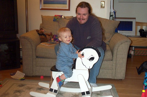 Tim on Rocking Horse (1-1-2004 18:42)
