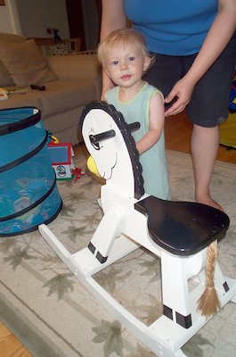 Tim with rocking horse (2004-07-04 19:04:36)