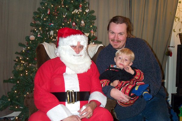 Tim and Ben with Santa (12-04-2004 17:32)