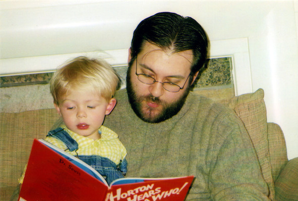 Juj reading 'Horton' to Tim (03-26-2005)