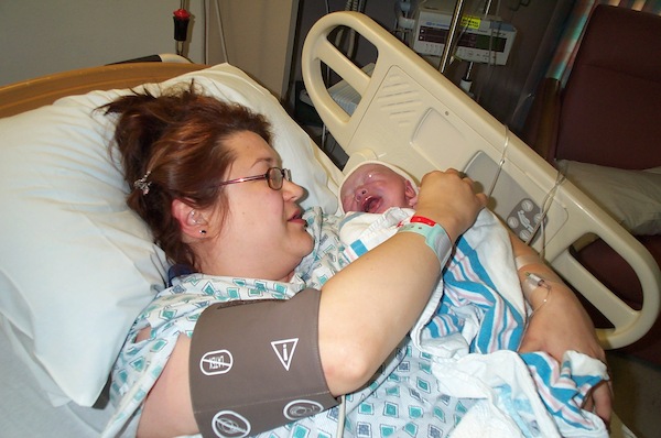 Mommy and baby cuddling (06-16-2005 10:29)