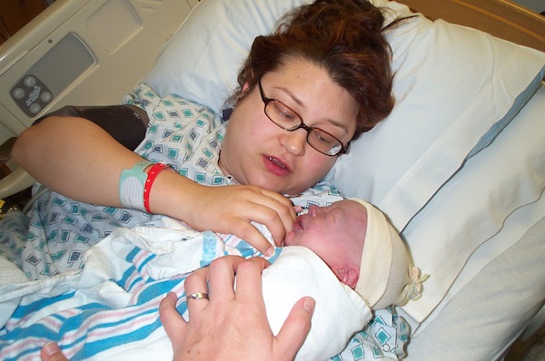 Mommy and baby cuddling (06-16-2005 10:29)