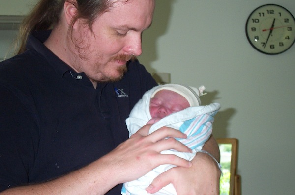 Daddy and baby (06-16-2005 15:01)