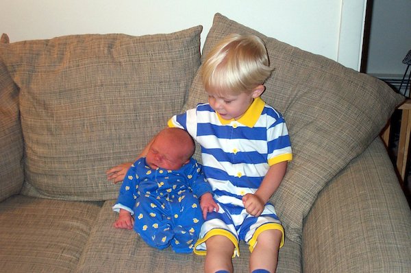 Tim and Nicholas cuddling on the couch (06-19-2005 08:54)