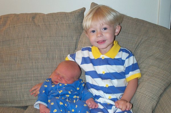 Tim and Nicholas cuddling on the couch (06-19-2005 08:54)