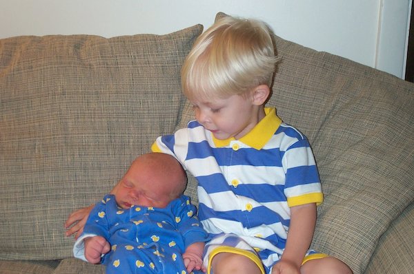 Tim and Nicholas cuddling on the couch (06-19-2005 08:54)