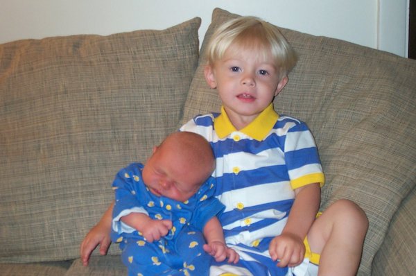 Tim and Nicholas cuddling on the couch (06-19-2005 08:55)