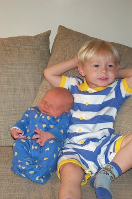 Tim and Nicholas cuddling on the couch (06-19-2005 08:55)