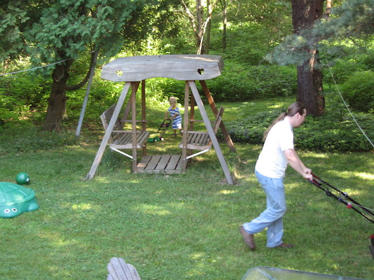 Tim and Ben mowing the lawn (07-24-2005 10:39)