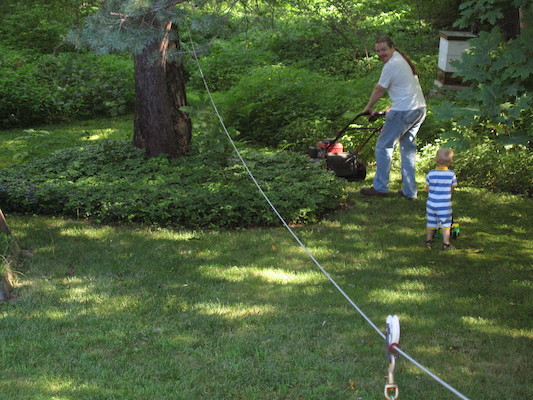 Tim and Ben mowing the lawn (07-24-2005 10:40)